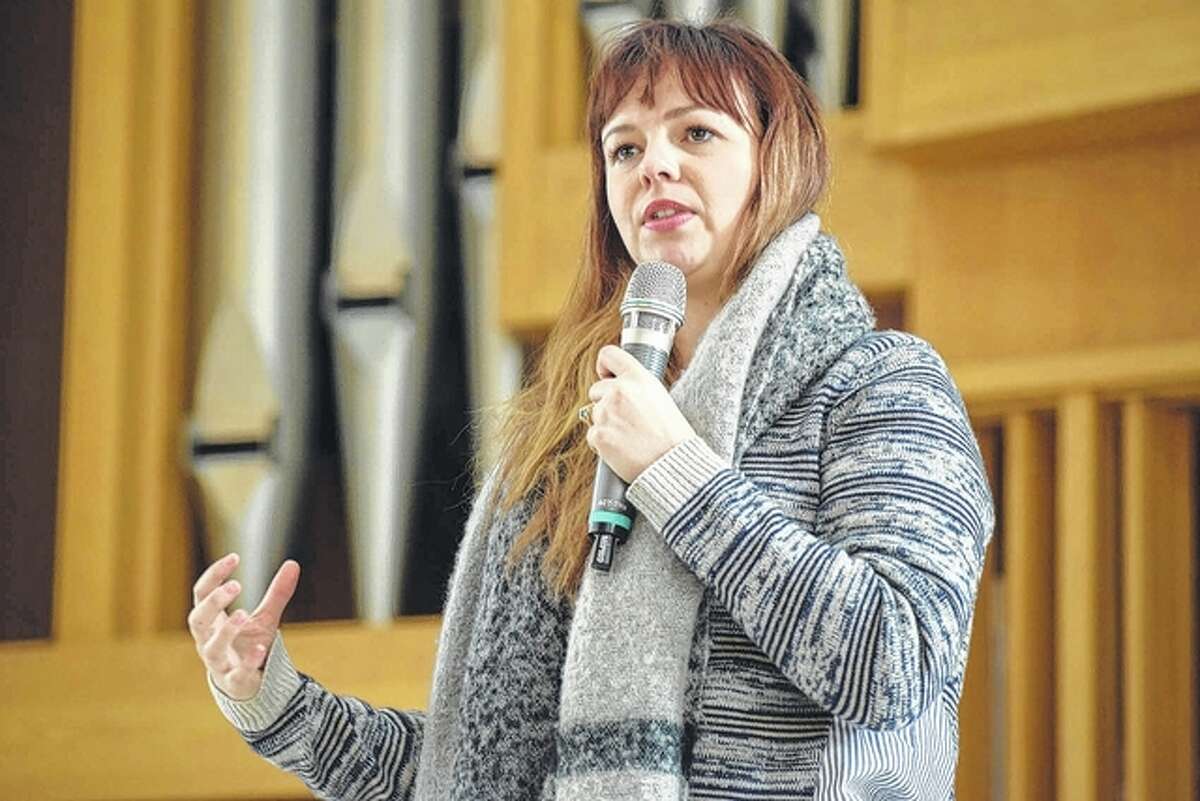 Actress Amber Tamblyn talks to a packed house Monday at Illinois College’s Rammelkamp Chapel. She is spending two days on campus as part of the college’s Woodrow Wilson Visiting Fellows lecture series.