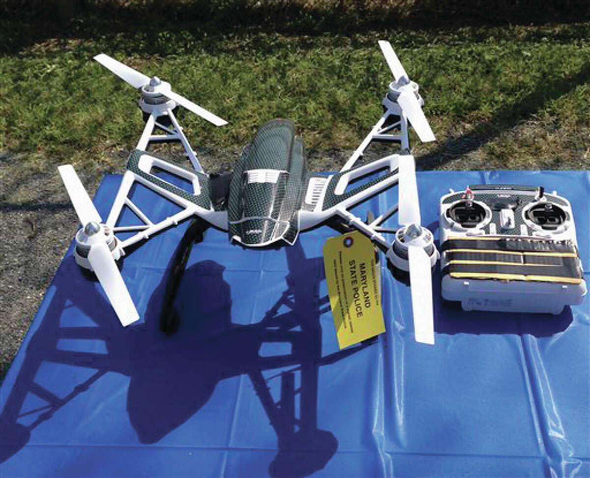This Aug. 24, 2015, file photo shows a Yuneec Typhoon drone and controller in Jessup, Maryland. Maryland State Police and prison officials say two men planned to use the drone to smuggle drugs, tobacco and pornography videos into the maximum-security Western Correctional Institution near Cumberland, Maryland. Illinois has yet to see a case where drones have been used to illegally smuggle items into correctional facilities, according to state officials, but lawmakers are proposing legislation to penalize the activity after seeing whats happened in other states.