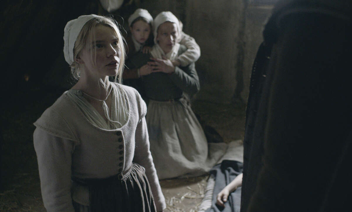 “The Witch” stars Anya Taylor-Joy, pictured, as Thomasin the eldest daughter of William (Ralph Ineson) and Katherine (Kate Dickie). Harvey Scrimshaw plays Caleb, one of the younger children.