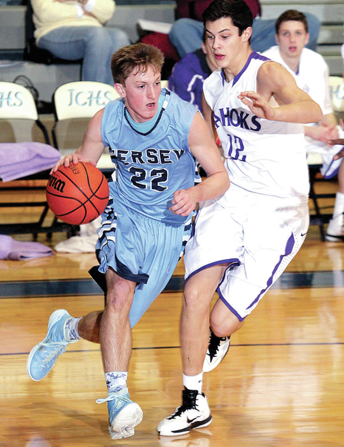 Jersey’s Zac Ridenhour, left, was one of three Panthers to score 17 points in Tuesday night’s victory over Waterloo. Jake Ridenhour and Drake Kanallakan each also netted 17 points. Zac Ridenhour is shown in action earlier this season against Collinsville.