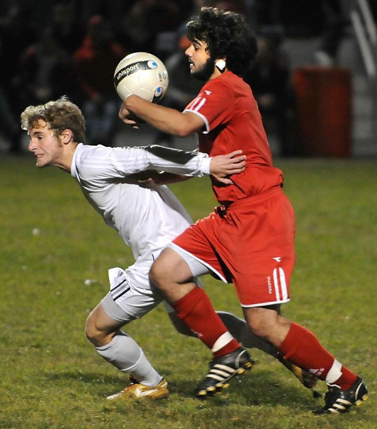 From left, Joe Cillis, of Voorheesville, and Nick Forget, of Waterford, battle for the ball during the Class CC/C boys' soccer playoff held in Colonie. (Lori Van Buren / Times Union)
