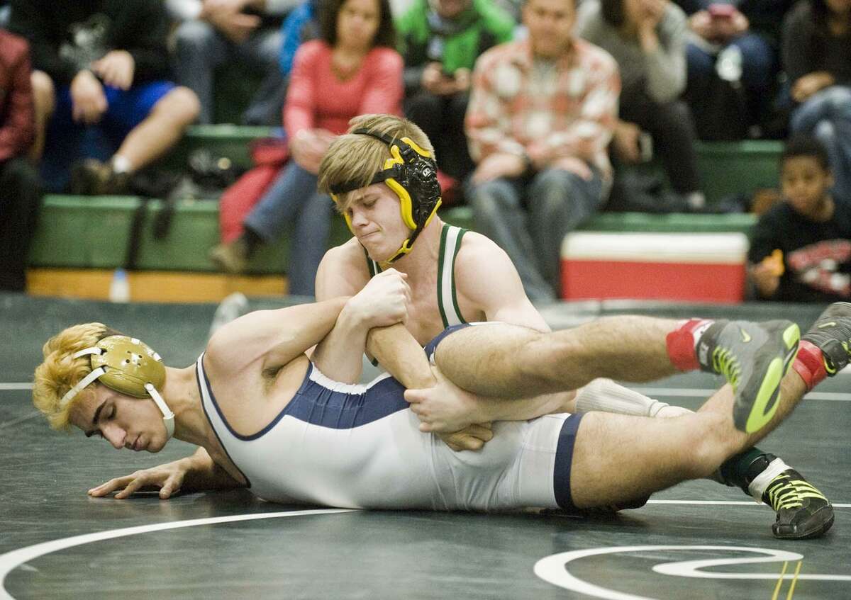 Wrestling New Milford dominates to win thirdstraight SWC championship