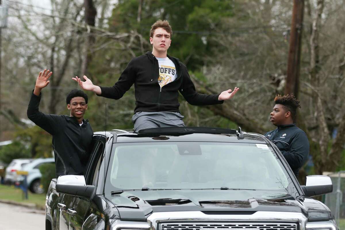 Conroe boys basketball players participate in the J-Mac Black History Month Parade and Awards Ceremony on Saturday, Feb. 10, 2018, in Conroe.