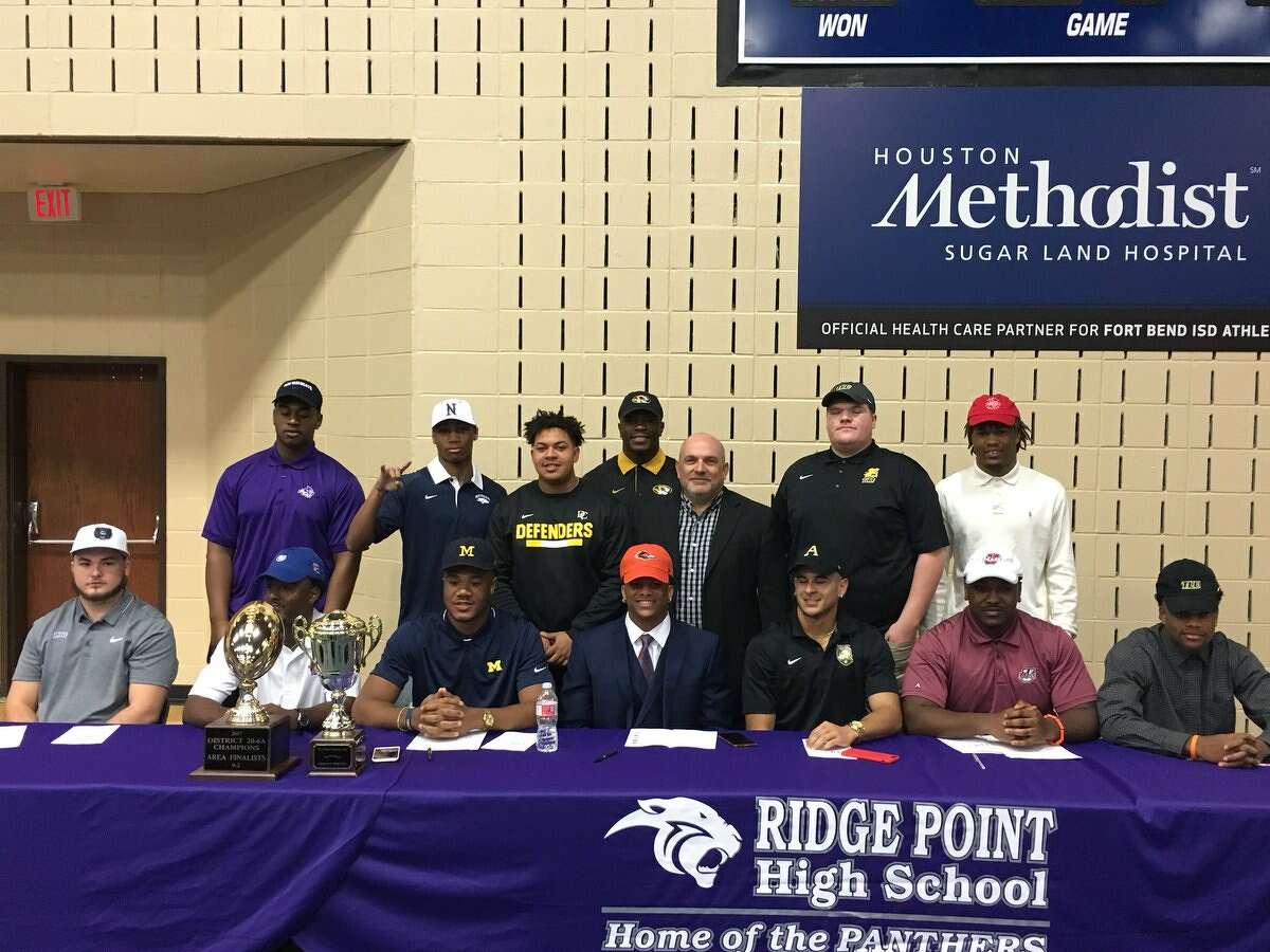 FBISD football players celebrate signing day