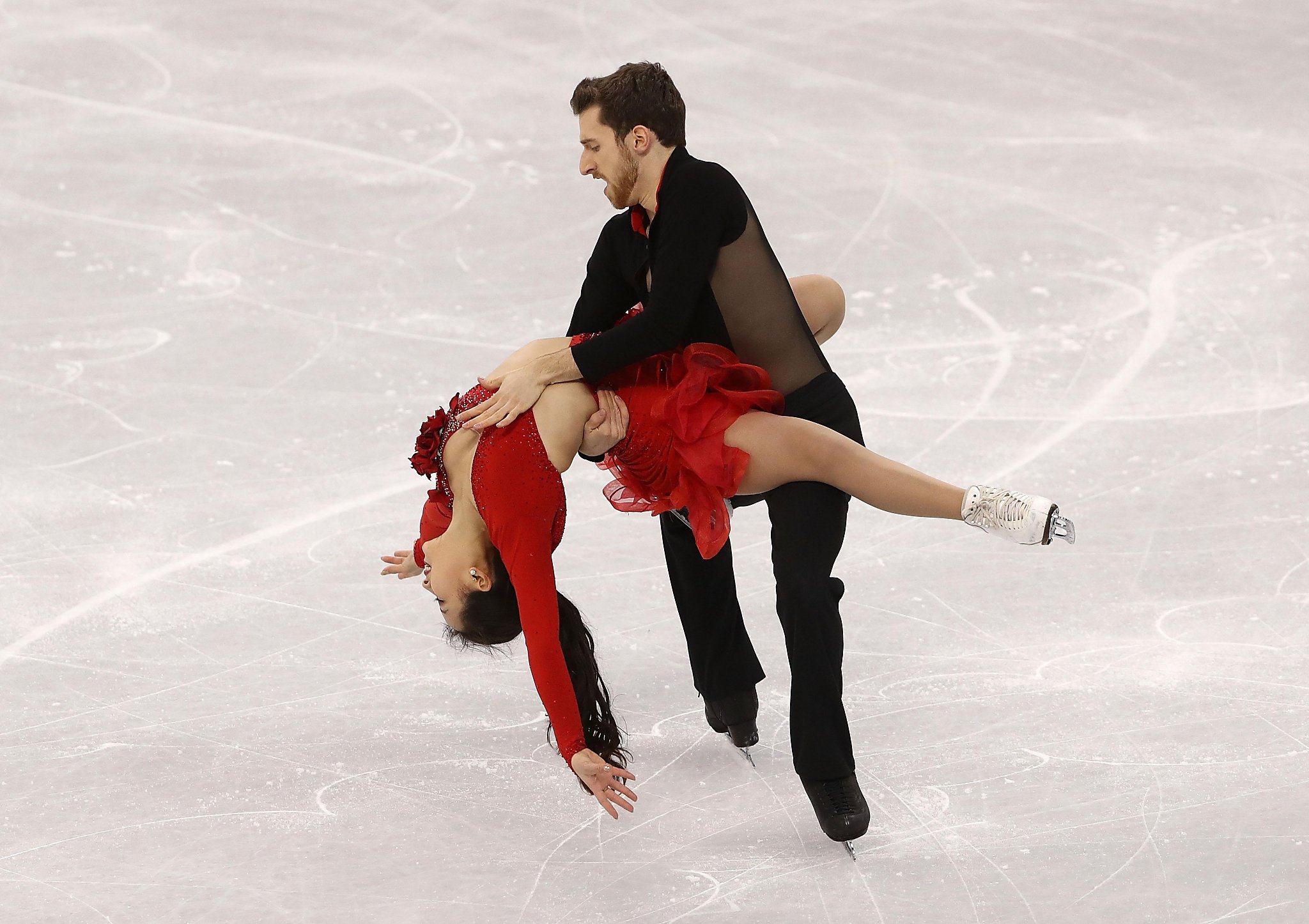 Ice Dancer Expertly Plays Off Wardrobe Malfunction During