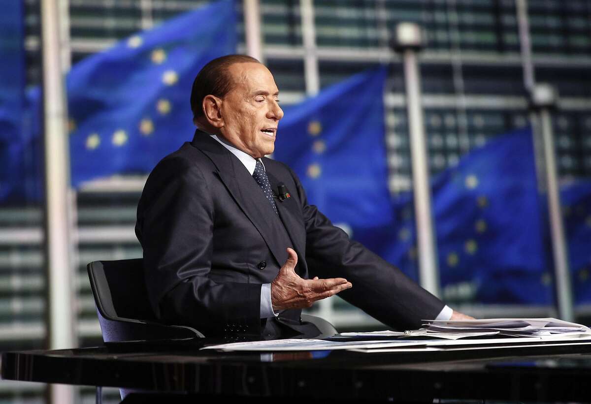 Italian former Premier Silvio Berlusconi speaks as he attends a TV show in Rome, Sunday, Feb. 11, 2018. Berlusconi can�t run for office because of a tax fraud conviction, but three-time former Premier is once playing king-maker on the Italian political scene ahead of the upcoming March 4 general election. (Giuseppe Lami/ANSA via AP)