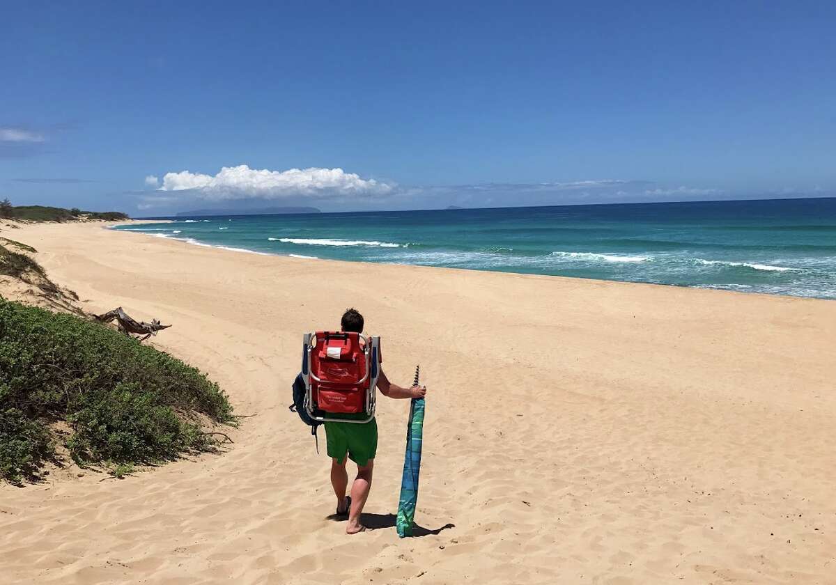 Kauai has opted out of the Hawaii's pre-travel testing program, which essentially halts all non-essential travel to the island. Pictured:Polihale State Park beach on the west side of Kauai