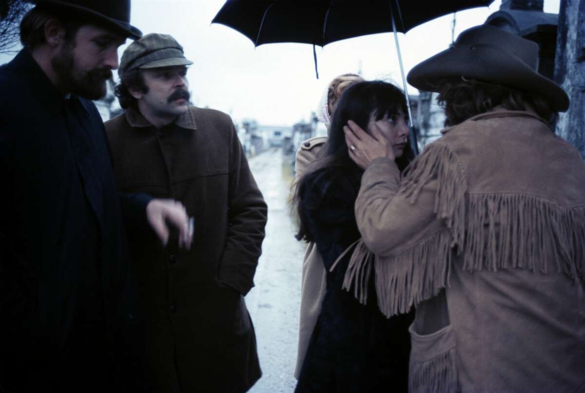 American actor and director Dennis Hopper (1936 - 2010) (right) and actress & singer Toni Basil under an umbrella during the filming of Hopper's directorial debut 'Easy Rider,' New Orleans, Louisiana, 1968.