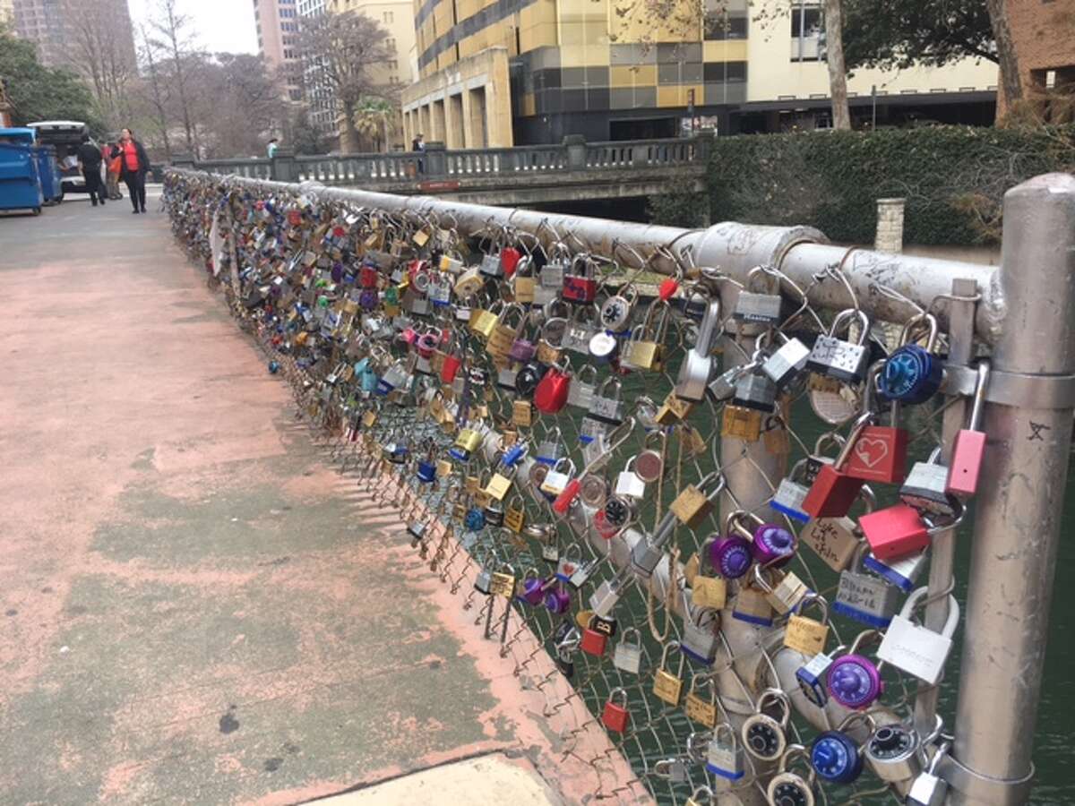 The love lock bridge, which was started by the Shavers, is outside the Courthouse Wedding Chapel at 126 East Main Plaza.