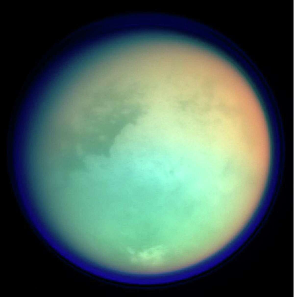 This photo shows Saturn’s moon, Titan, in ultraviolet and infrared wavelengths. Scientists have been fascinated with Titan for many years because, similar to Earth, Saturn’s largest moon has a nitrogen-dominated atmosphere.