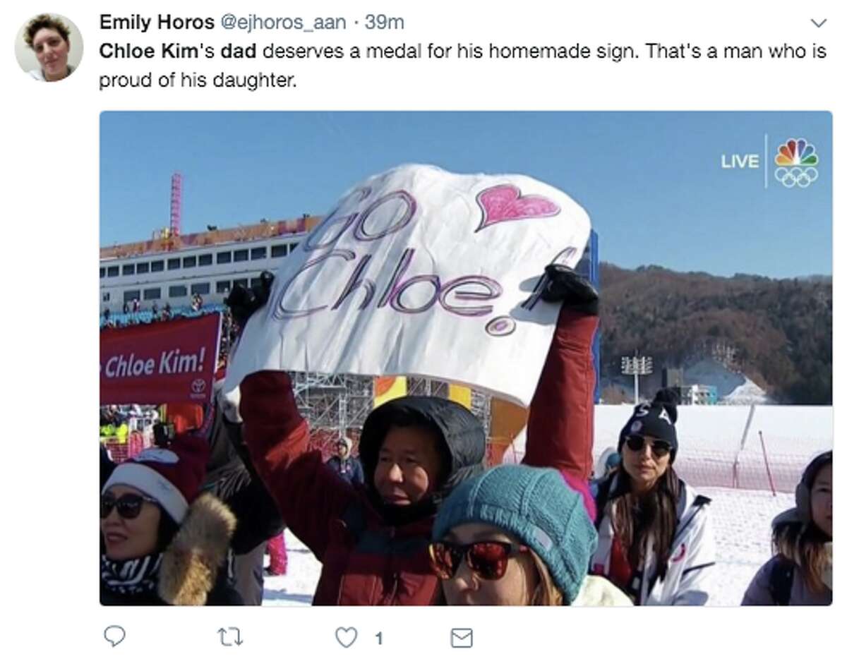 The internet loved Chloe Kim's father's handmade sign during her Monday night Women's Half Pipe win.