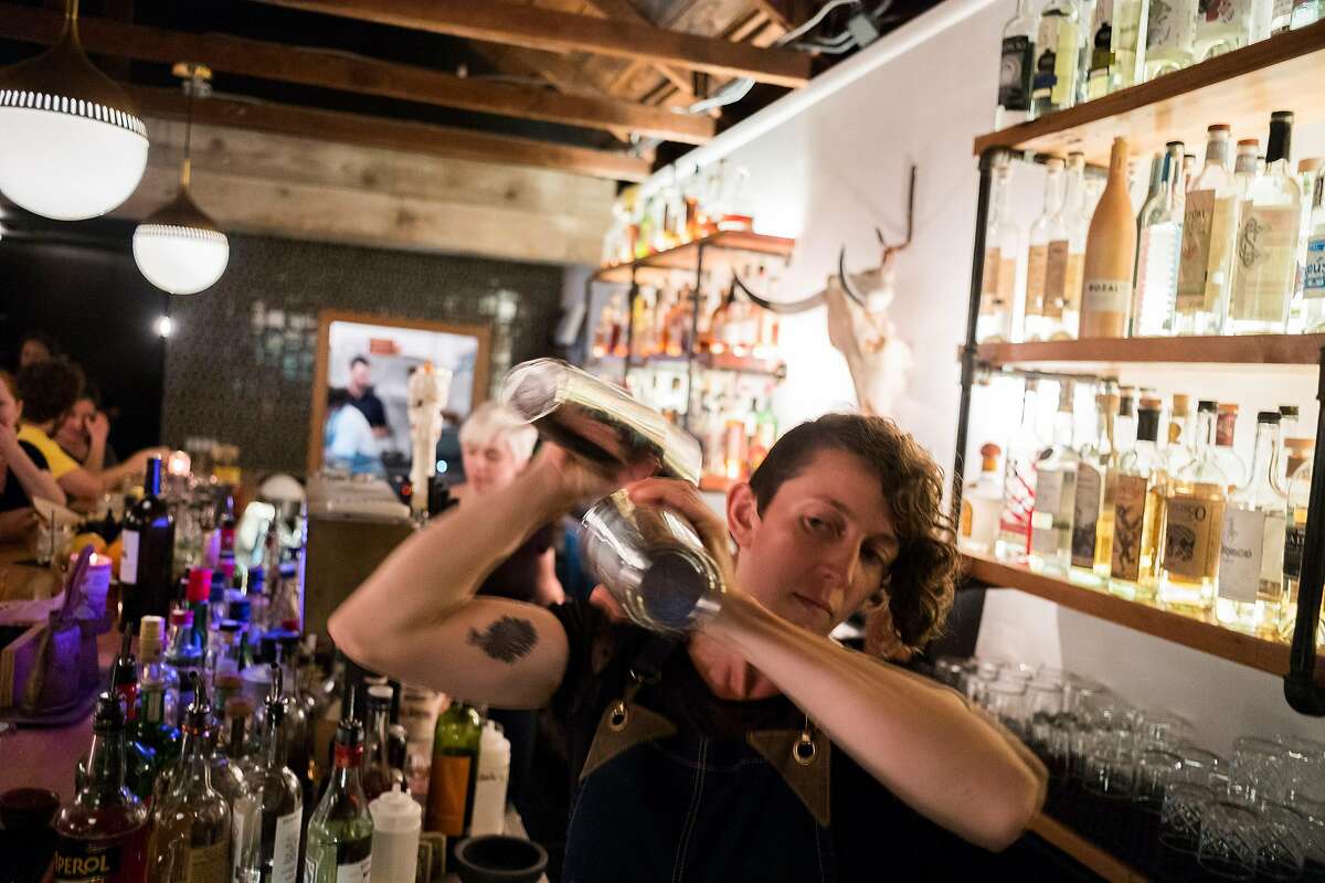 General manager Zoe Rem creates craft cocktails at El Barrio, a bar in Guerneville, CA specializing in tequila, mescal, bourbon and craft cocktails on Feb. 3, 2018.