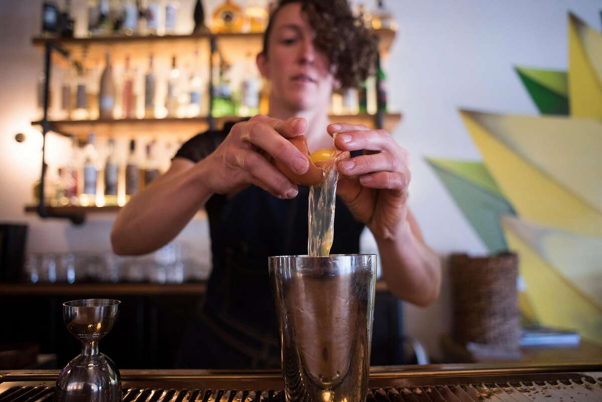 General manager Zoe Rem creates a craft cocktail at El Barrio, a bar in Guerneville, CA specializing in tequila, mescal, bourbon and craft cocktails on Feb. 3, 2018.
