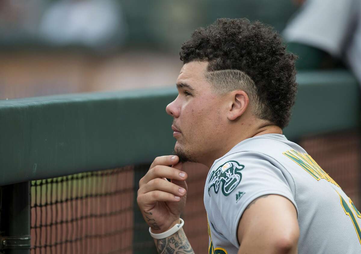 SEATTLE, WA - SEPTEMBER 3: Bruce Maxwell #13 of the Oakland Athletics watches play from the dugout during a game against the Seattle Mariners at Safeco Field on September 3, 2017 in Seattle, Washington. The Mariners won the game 10-2. ~~