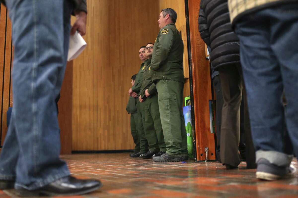 U.S. Border Patrol agents stand outside the Frank Ferree Jury Room in the Cameron County Courthouse as jury selection begins in the capital murder trial of Mexican national Gustavo Tijerina-Sandoval in Brownsville, Texas, Tuesday, Feb. 13, 2018. Tijerina-Sandoval is accused of killing U.S. Border Patrol agent Javier Vega, Jr. in August of 2014. Vega was fishing with his family in Santa Monica, a secluded area near Harlingen, when two men attempted to rob the group. Vega pulled out his weapon and was shot in the chest. He died en route to the hospital. Tijerina-Sandoval and Ismael Hernandez-Vallejo are both charged in Vega's death, but their trials will be held separately.