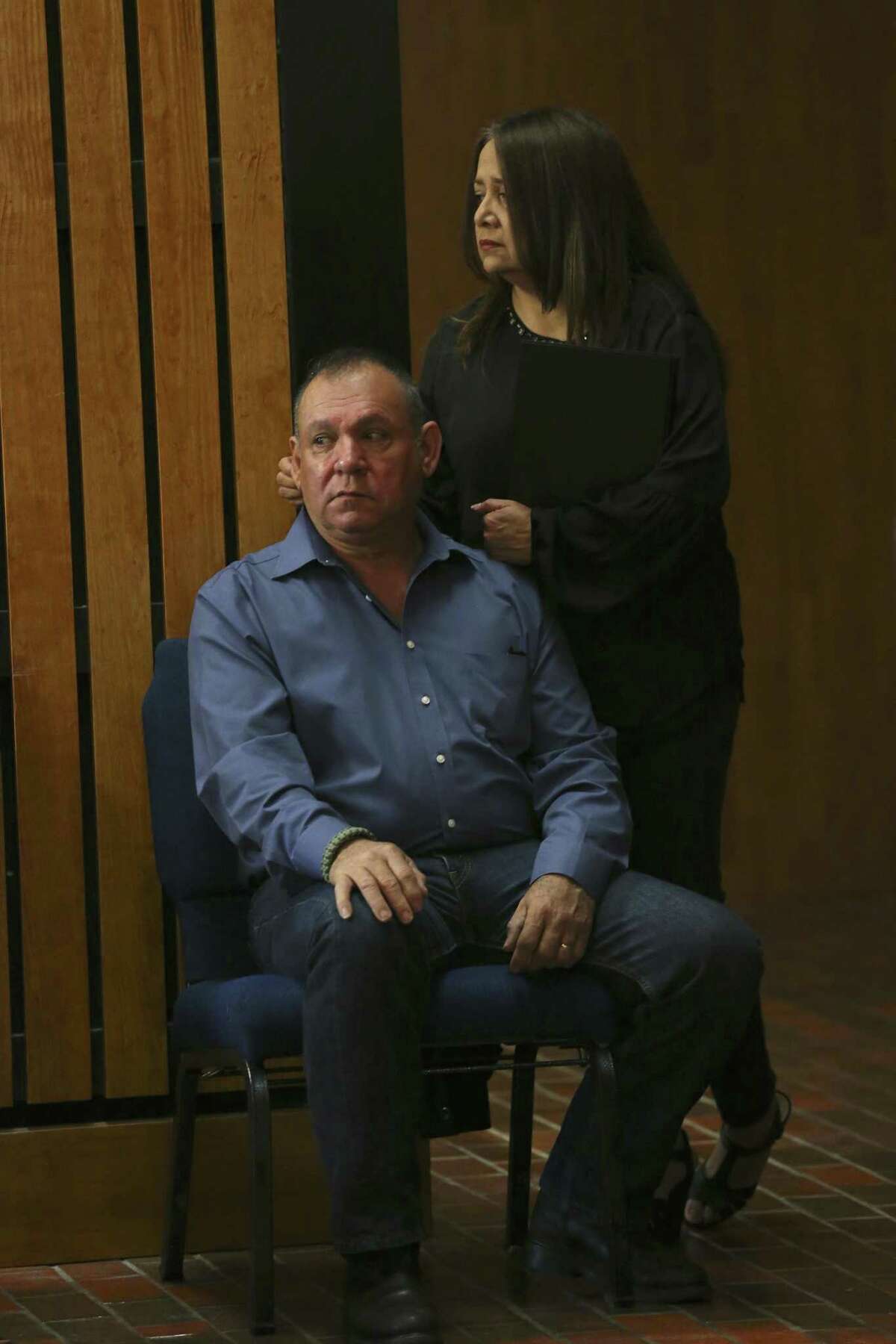 Marie and Javier Vega, Sr. wait outside the Frank Ferree Jury Room at the Cameron County Courthouse as jury selection begins in the capital murder trial of Mexican national Gustavo Tijerina-Sandoval in Brownsville, Texas, Tuesday, Feb. 13, 2018. Tijerina-Sandoval is accused of killing their son, U.S. Border Patrol agent Javier Vega, Jr., in August of 2014. Vega was fishing with his family in Santa Monica, a secluded area near Harlingen, when two men attempted to rob the group. Vega pulled out his weapon and was shot in the chest. He died en route to the hospital. Tijerina-Sandoval and Ismael Hernandez-Vallejo are both charged in Vega's death, but their trials will be held separately. The elder Vega was also shot in the incident.