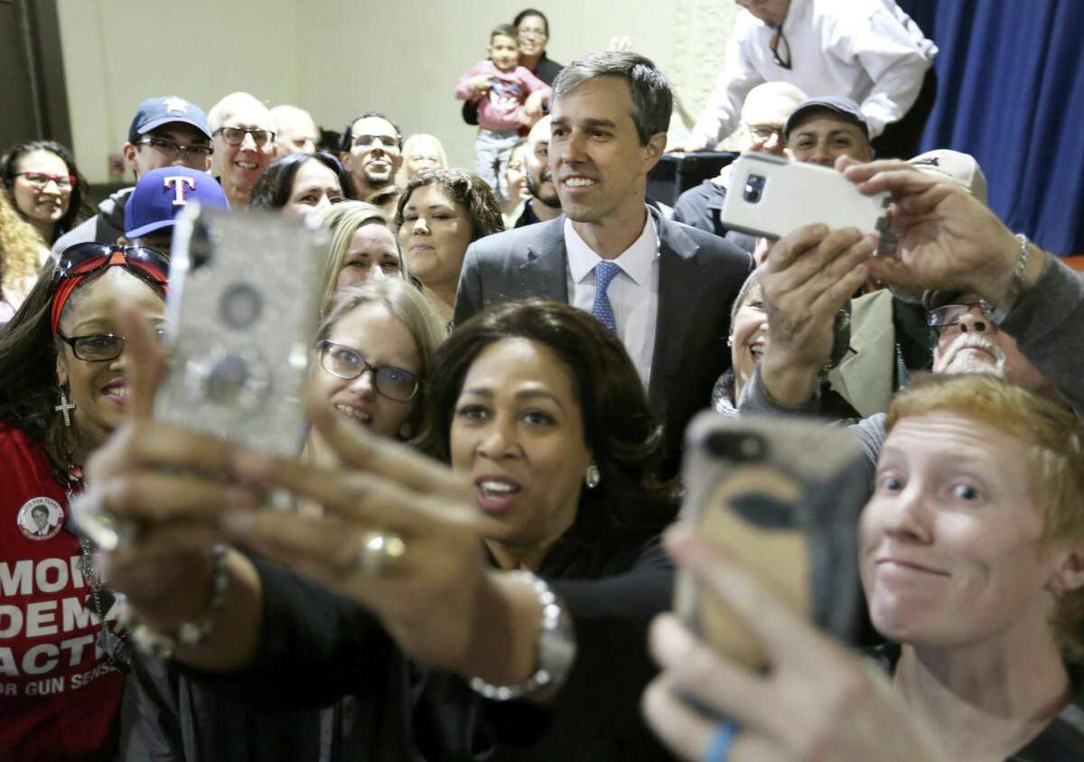 Congressman Beto O'Rourke (D-El Paso) poses for group photos Tuesday, Feb. 13, 2018 after conducting a town hall meeting at the Ella Austin Community Center on San Antonio's east side. O'Rourke is seeking the Democratic primary nomination to run against current U.S. Senator Ted Cruz. Early voting starts Feb. 20 with primary day March 6.