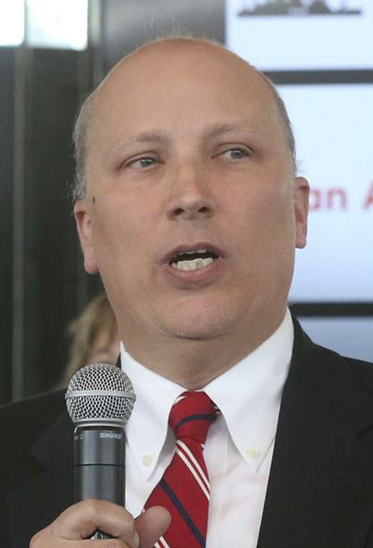 Congressional District 21 candidate Chip Roy (foreground, holding microphone) speaks Thursday January 11, 2018 at the Old San Francisco Steakhouse during a forum held during a meeting of the San Antonio Republican Women. The forum introduced 15 candidates running for the seat held in Congressional District 21 held by Representative Lamar Smith.