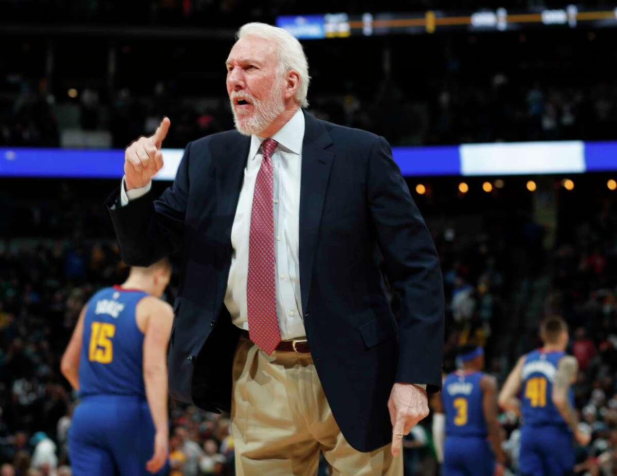 San Antonio Spurs head coach Gregg Popovich yells at players while facing the Denver Nuggets in the first half of an NBA basketball game Friday, Dec. 28, 2018, in Denver. (AP Photo/David Zalubowski)
