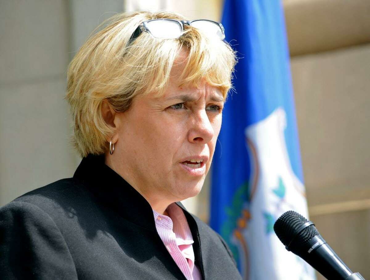 Lori Pelletier, president of the Connecticut AFL-CIO, speaks at the ceremony to mark the 29th anniversary of the L'Ambiance Plaza collapse that killed 28 construction workers. Representatives of organized labor, city officials and friends of the victims gathered Friday, April 22, 2016 at City Hall in Bridgeport, Conn. to pay tribute to the workers who died, their families, the rescue workers and all those who assisted in any way during and after the collapse.