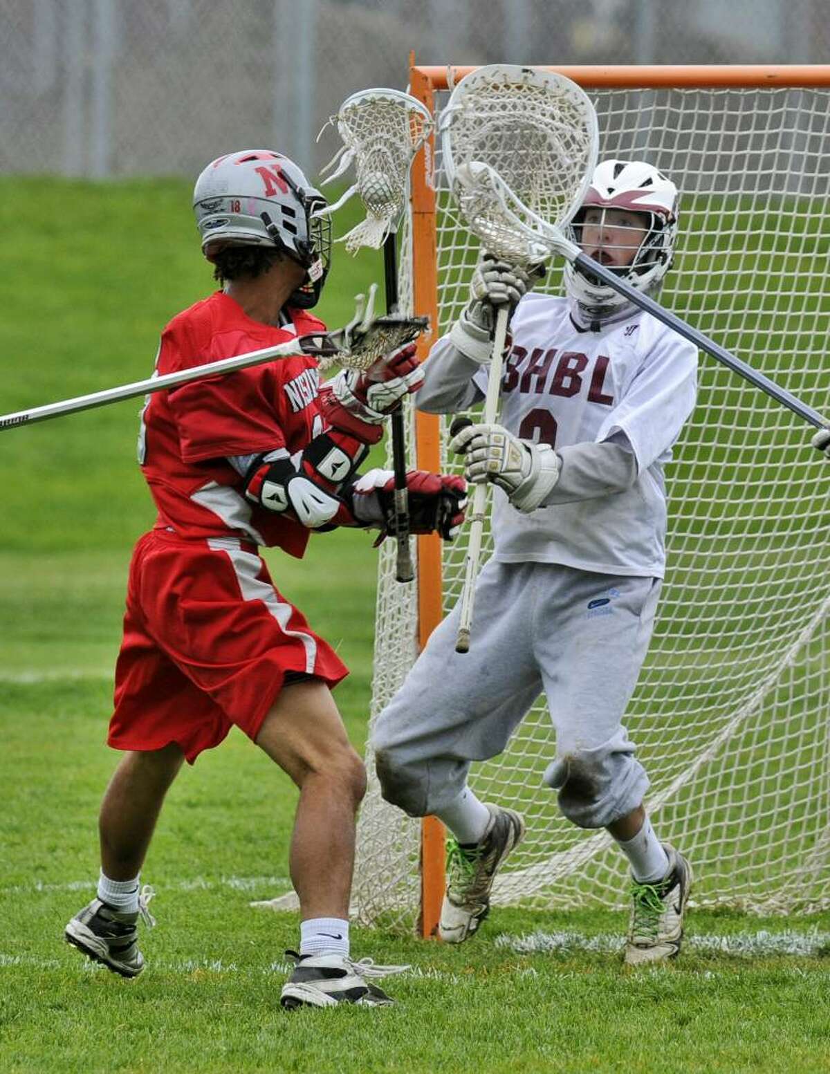 Goalkeeper Connor Nash, right, is one of the players Burnt Hills is counting on as the rebuilding program hopes to become a contender in boys' lacrosse. ( Philip Kamrass / Times Union)