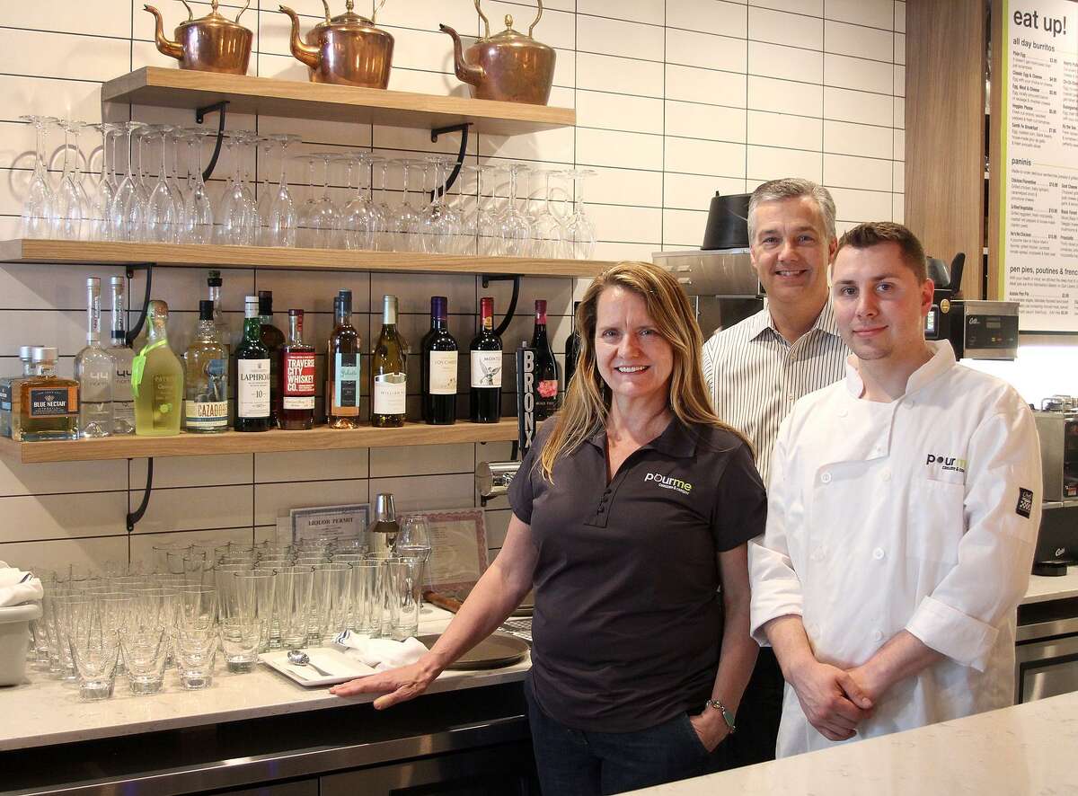 Owner Andrea Gartner, consultant Mark Moeller and chef Matt Rieve in the Pour Me cafe on Main Street in Danbury.