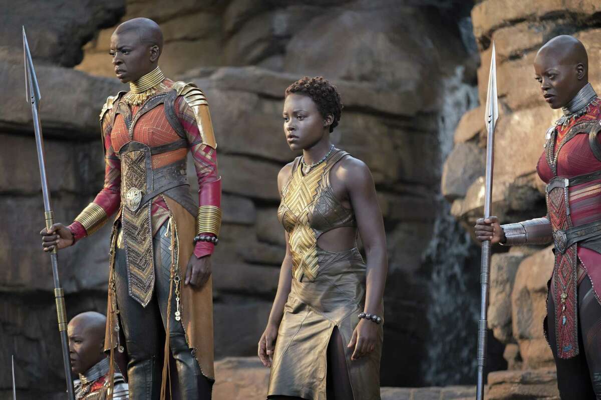 Okoye (Danai Gurira), Nakia (Lupita Nyong'o) and Ayo (Florence Kasumba) in a scene from “Black Panther.”