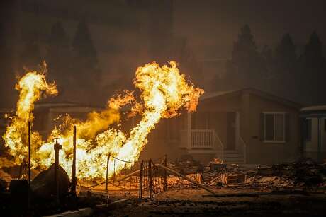 The Journey's End mobile home park burns during a the Tubbs fire on Mendocino Avenue in Santa Rosa, Calif., on Monday, Oct. 9, 2017.
