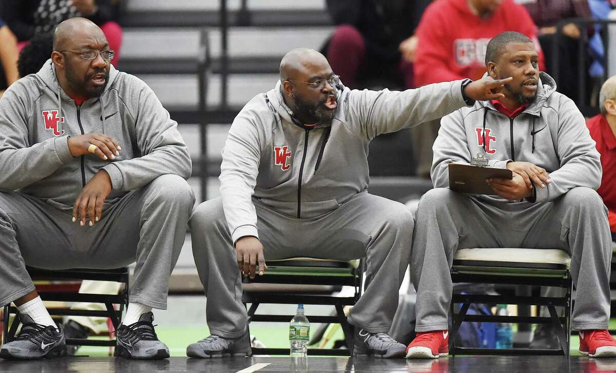 Wilbur Cross head coach Kevin Walton calls out from the sidelines against Hillhouse in a cross-town rival game, Wednesday, Feb. 14, 2018, at the Floyd Little Athletic Center in New Haven. The Governors won, 65-50.