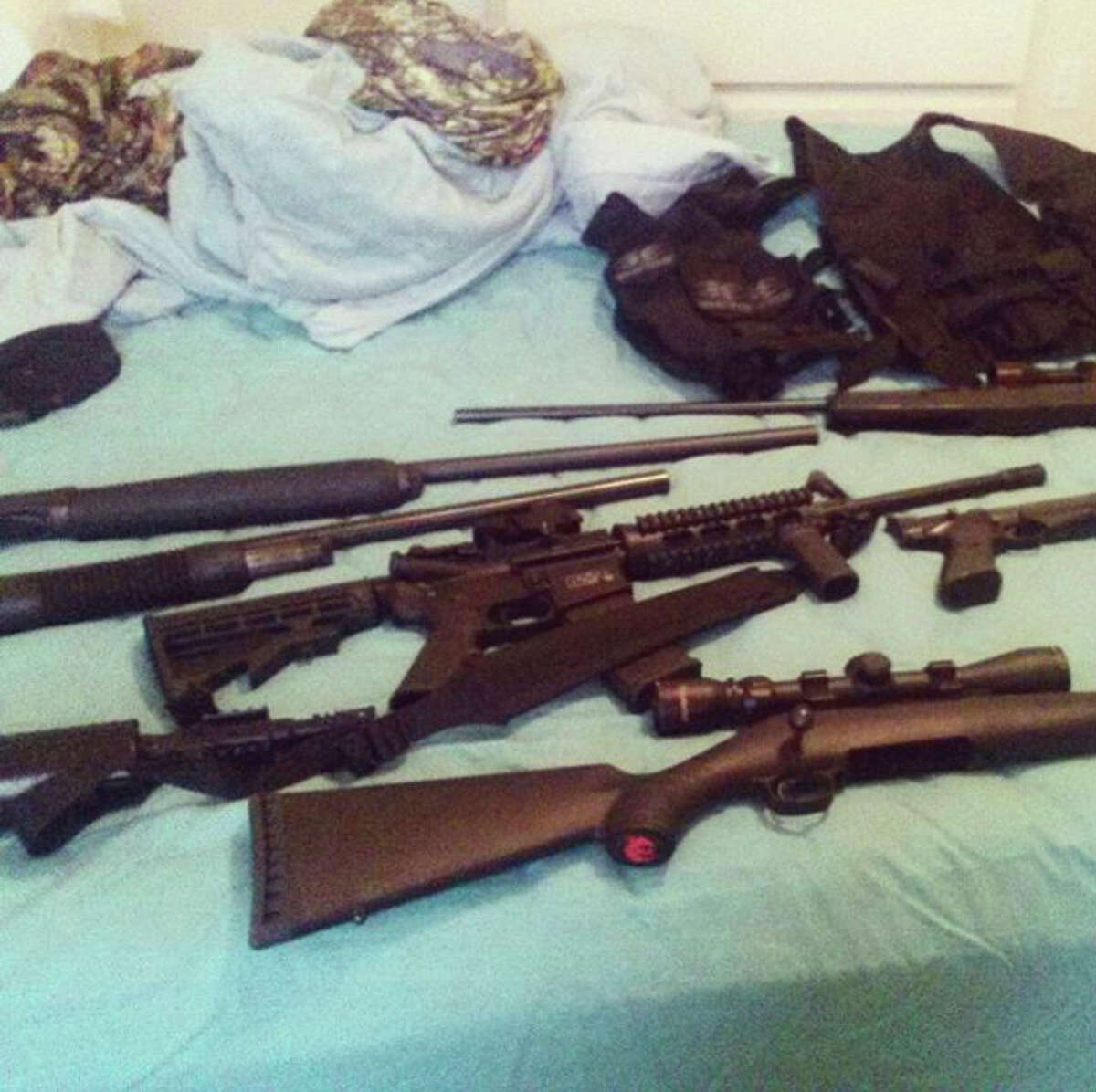 This photo posted on the Instagram account of Nikolas Cruz shows weapons lying on a bed. Cruz was charged with 17 counts of premeditated murder on Thursday, Feb. 15, 2018, the day after opening fire with a semi-automatic weapon in the Marjory Stoneman Douglas High School in Parkland, Fla.