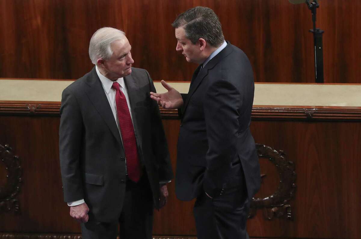 Attorney General Jeff Sessions (left) talks with Sen. Ted Cruz, R-Texas, after President Donald Trump’s address on Jan. 30 to a joint session of Congress. On Thursday, Cruz said Republicans will lose the majorities in both the U.S. House and Senate if they support an immigration deal that provides a path to citizenship for so-called Dreamers.