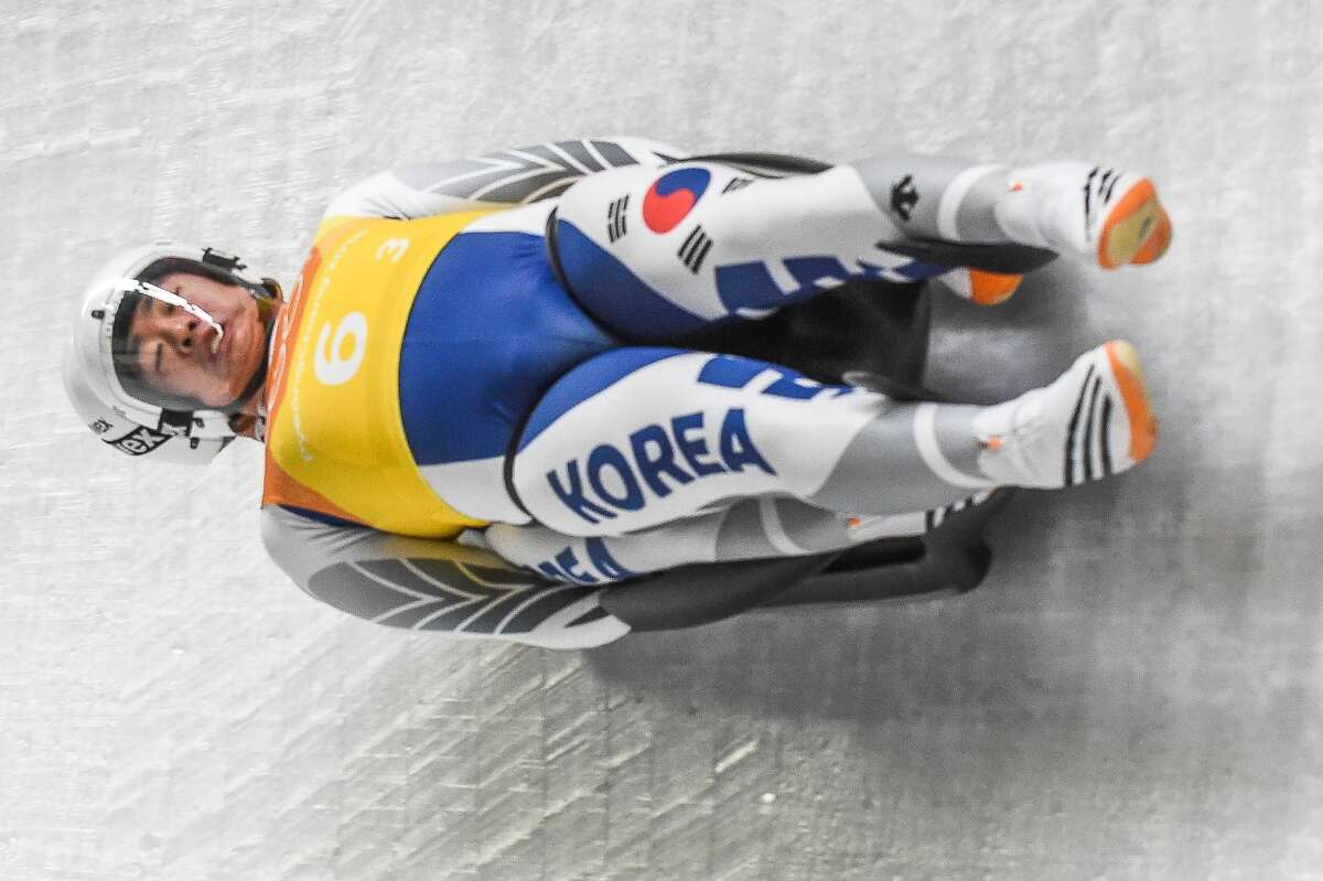 Cho Jung Myung and Park Jinyong of Â South Korea competing in luge Team Relay Competition at Olympic Sliding Centre at Pyeongchang , South Korea on February 15, 2018.