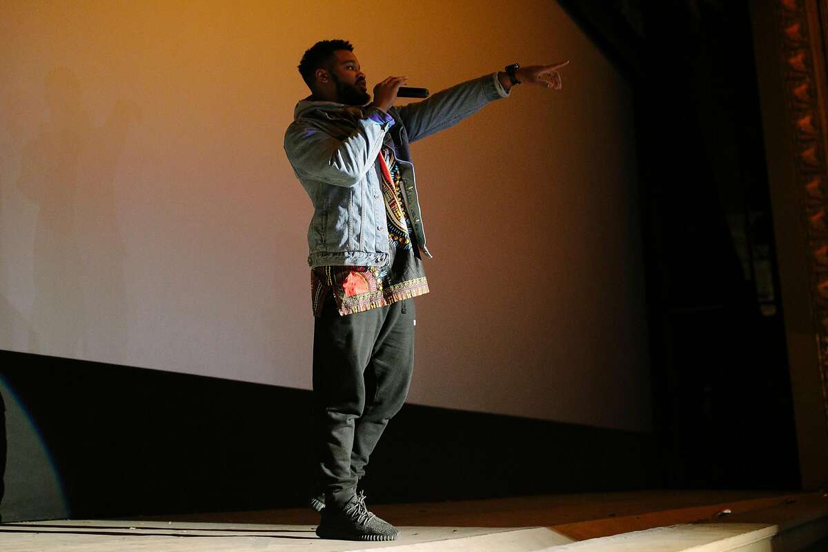 "Black Panther" director Ryan Coogler, surprises the crowd before the Feb. premiere of Black Panther at Grande Lake Theatre in Oakland, Calif. Following the movie's success, Disney has just announced a $1 million donation for STEM programs around the country.