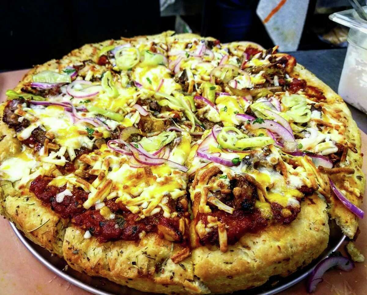 A smoked brisket barbecue pizza made during early recipe tests for the forthcoming restaurant Whiskey Rose