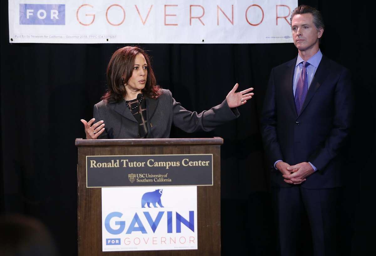 Sen. Kamala Harris, left, endorses California Lt. Gov. Gavin Newsom, right, for the 2018 California governor's race at the Ronald Tutor Campus Center at the University of Southern California in Los Angeles on Friday, Feb. 16, 2018.