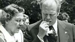 In a Express-News file photo of President Gerald Ford attempts to eat a tamal, shuck and all, April 9,1976.