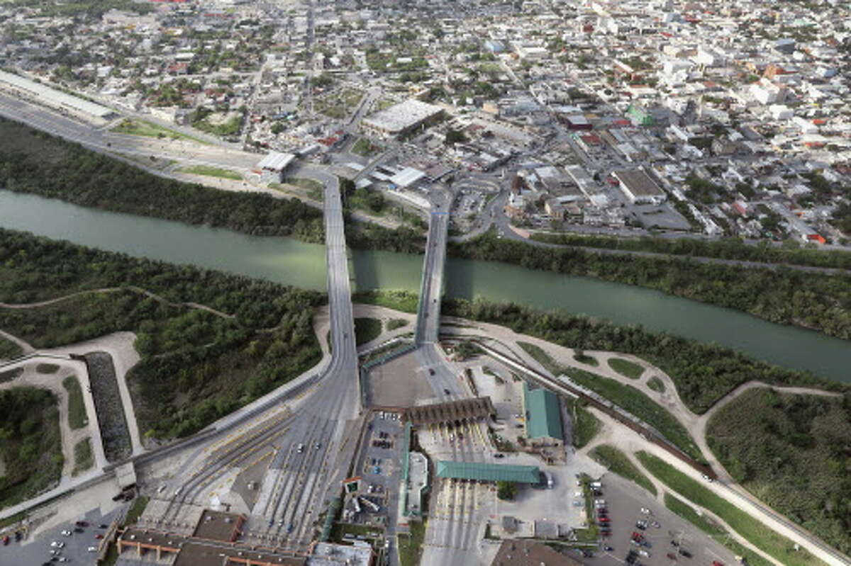 The Rio Grande flows under the McAllen-Hidalgo-Reynosa International Bridge. McAllen, Texas, and Reynosa in Tamaulipas Mexico form a metropolitan cross-border business area.