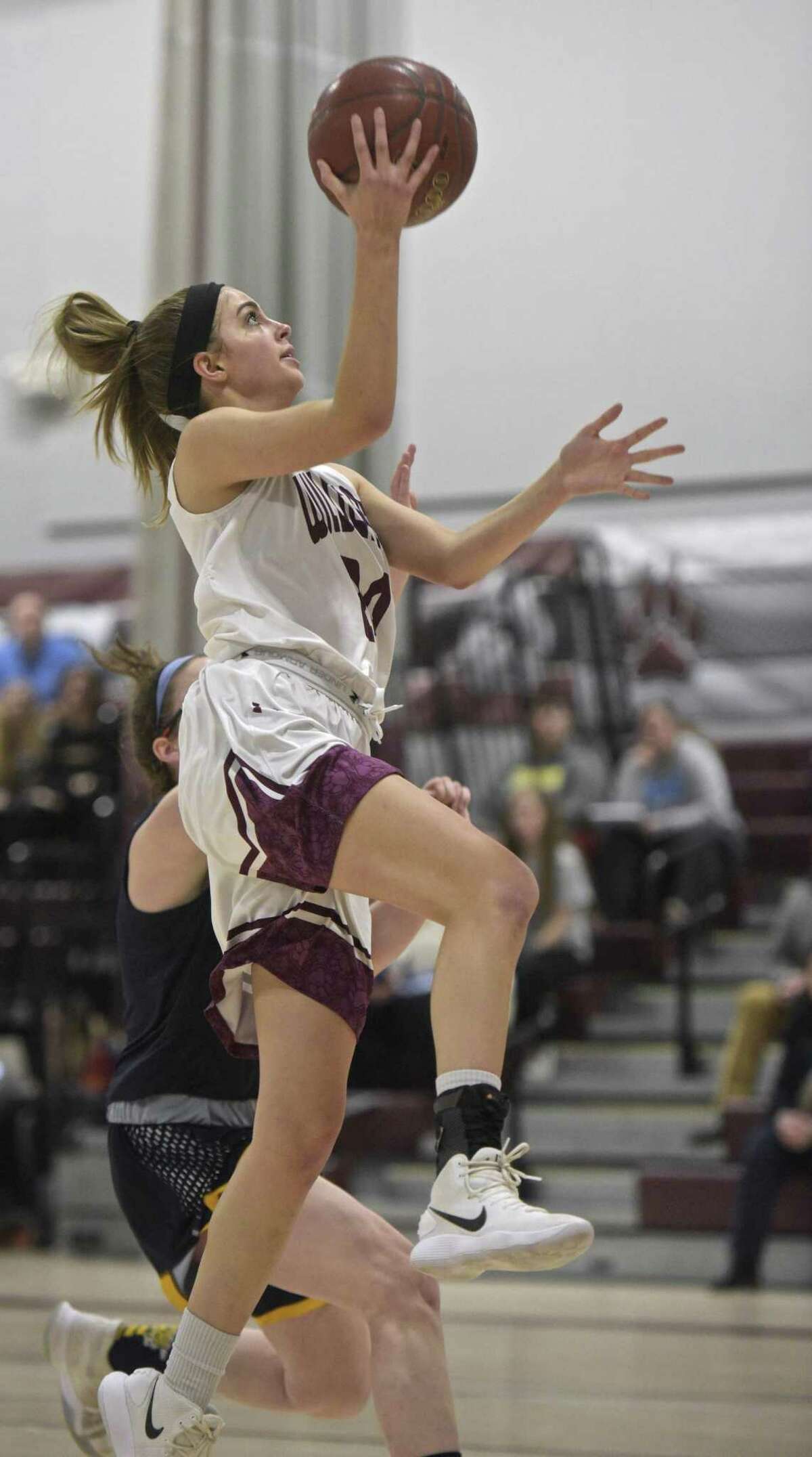 Bethel’s Britney Roach goes to the basket in the girls SWC basketball quarterfinal game against Weston on Friday night at Bethel High School. Bethel won 48-34.
