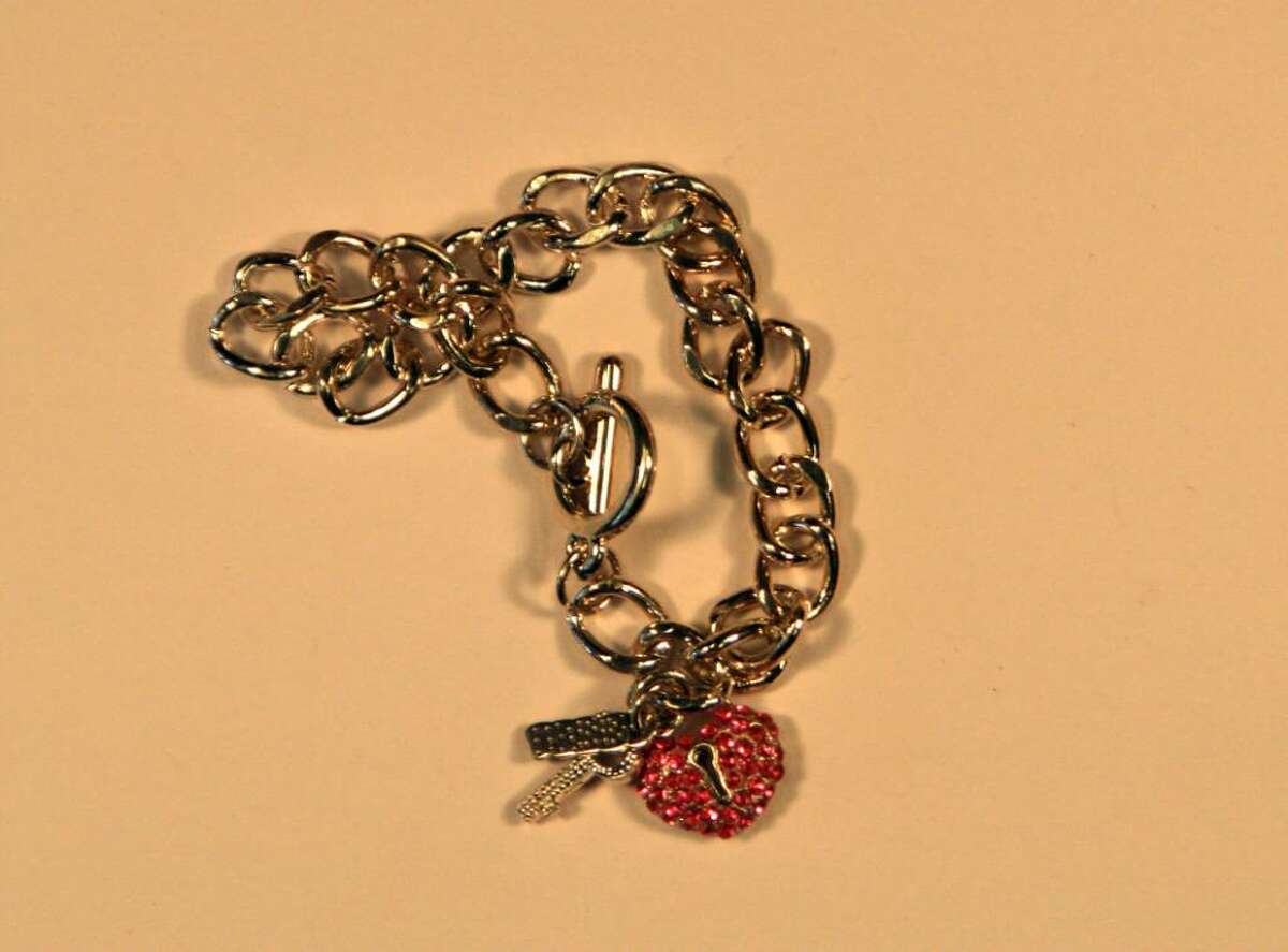This undated photo shows a Best Friends bracelet purchased at Claire's, a jewelry chain with nearly 3,000 stores in North America and Europe. Barred from using lead in children's jewelry because of its toxicity, some Chinese manufacturers have been substituting the more dangerous heavy metal cadmium in sparkling charm bracelets and shiny pendants being sold throughout the United States, an Associated Press investigation shows. (AP Photo/Jeff Weidenhamer, Ashland University)