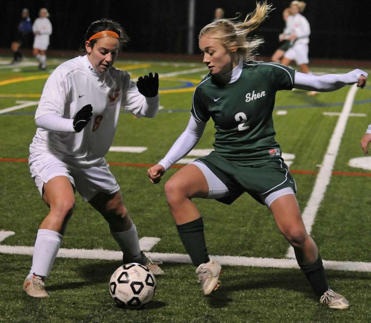 Michelle Primomo of Bethlehem, left, and Kristen Connors of Shenendehowa battle for the ball during the Class AA girls' soccer title game Wednesday, November 11, 2009, in Clifton Park. (Lori Van Buren / Times Union)