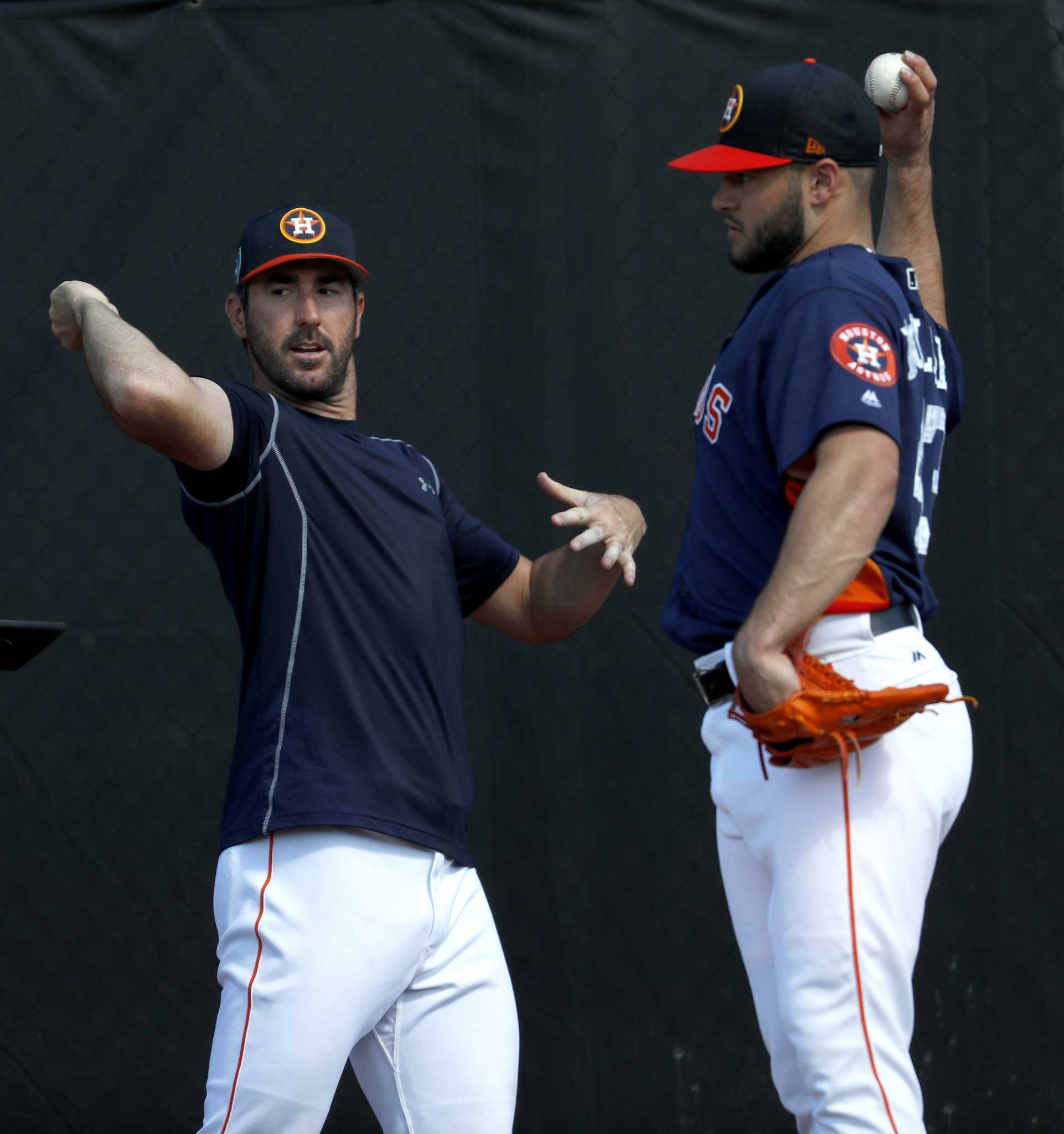 Houston Astros pitcher Lance McCullers Jr. (43) signs a fan's