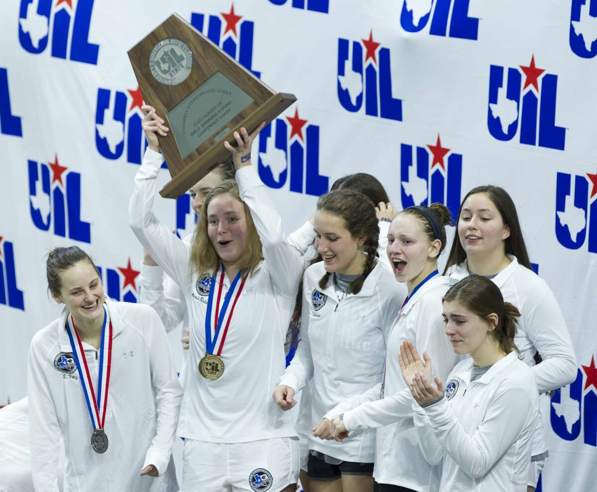Kingwood Park girls swimmers celebrate after winning second place overall during the UIL State Swimming & Diving Championships at the Lee and Joe Jamail Texas Swim Center on Saturday, Feb. 17, 2018, in Austin.