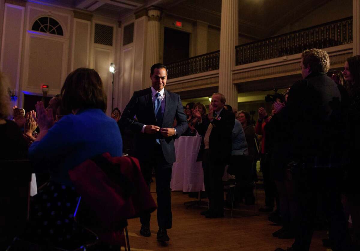 Former Housing and Urban Development Secretary, Julián Castro, of San Antonio, Texas heads to the stage during the New Hampshire Young Democrats annual Granite Slate Awards dinner in Manchester, New Hampshire on Friday night, February 16, 2018. Castro delivered the keynote address, just one of several stops while visiting the state. John Tully for the San Antonio Express-News
