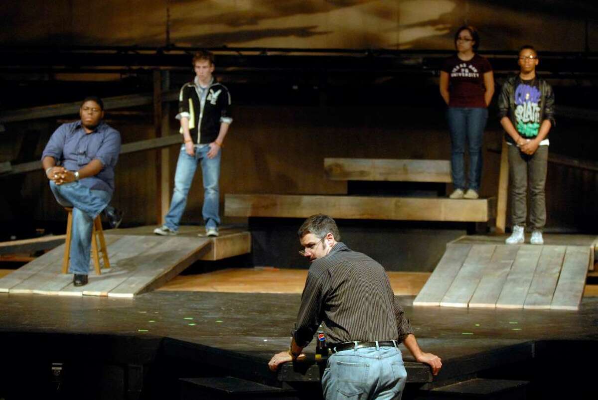 Ward Dales,center, directs a scene during a rehearsal of the Albany High School production of the Laramie Project in Albany, New York 11/10/2009.