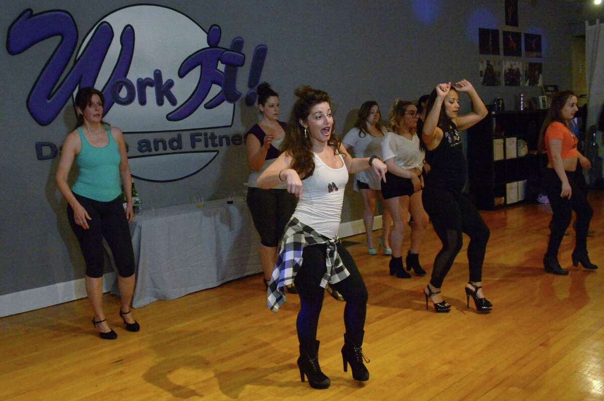 Connecticut native Caitlin Elby teaches the a fitness class she developed, Hell on Heels, that helps women walk and move correctly in high heels at Work It Dance and Fitness Saturday, February 17, 2018, in Norwalk Conn. Now, Elby brings the class back to Connecticut after developing in New Tork.
