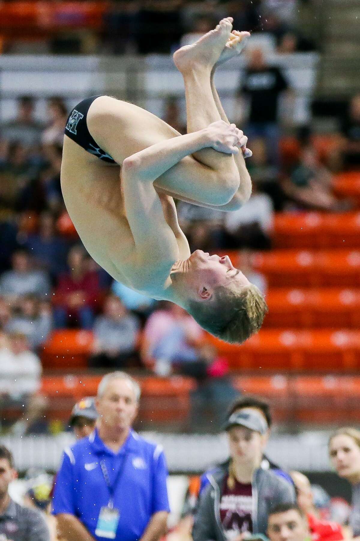 Harlan's Nicholas McCann competes in the 5A boys 1-meter diving during the UIL Class 5A and Class 6A state championships at the University of Texas' Jamail Center in Austin on Saturday, Feb. 17, 2018. McCann finished sixth in the event with a score of 289.55 points. MARVIN PFEIFFER/mpfeiffer@express-news.net