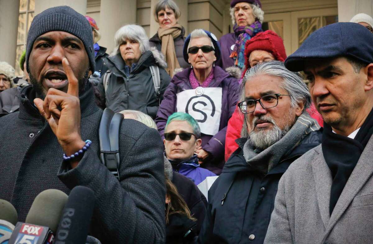 Council members Jumaane Williams, far left, and Ydanis Rodriguez, far right, hold a press conference on behalf of Ravi Ragbir, second from right, a citizen of Trinidad and Tobago and executive director of the New Sanctuary Coalition of New York City, Wednesday Jan. 31, 2018, at New York City Hall. Williams and Rodriguez were arrested as they attempted to block authorities from taking Ragbir into custody on Jan. 11 after a routine check-in with immigration officials in New York. A federal judge on Monday ordered authorities to immediately release Ragbir on the grounds he hadn't been given enough time to say goodbye to his family.