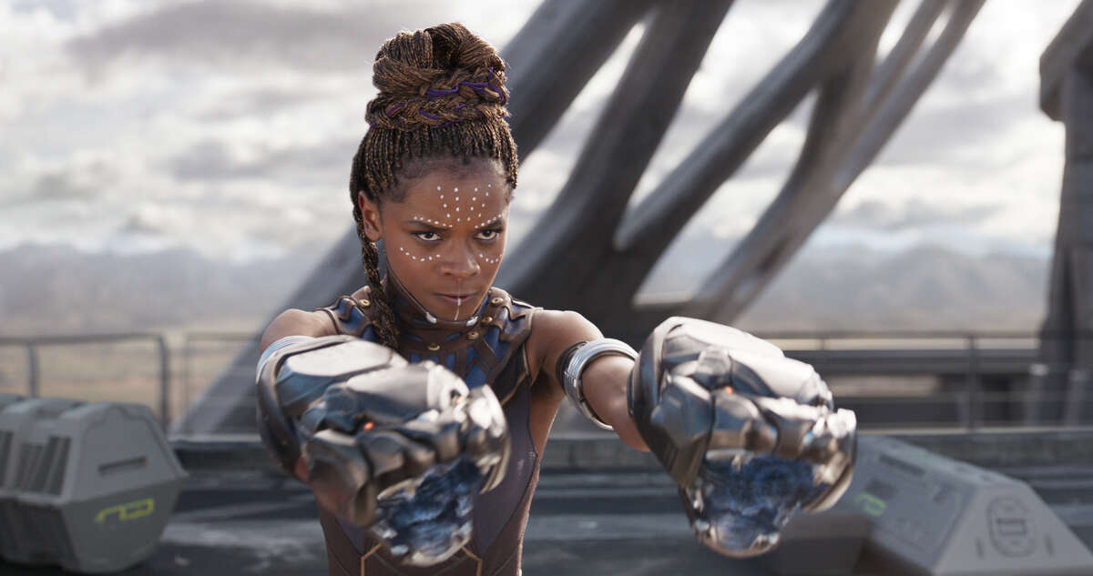 This image released by Disney -Marvel Studios shows Letitia Wright in a scene from "Black Panther." Actress Danai Gurira says the representation of women in the film is important for young girls to see. The film features a number of powerful female leads, including Gurira as the head of a special forces unit, Lupita Nyong?’o as a spy, Angela Bassett as the Queen Mother and newcomer Wright as a scientist and inventor. (Matt Kennedy/Disney/Marvel Studios via AP)