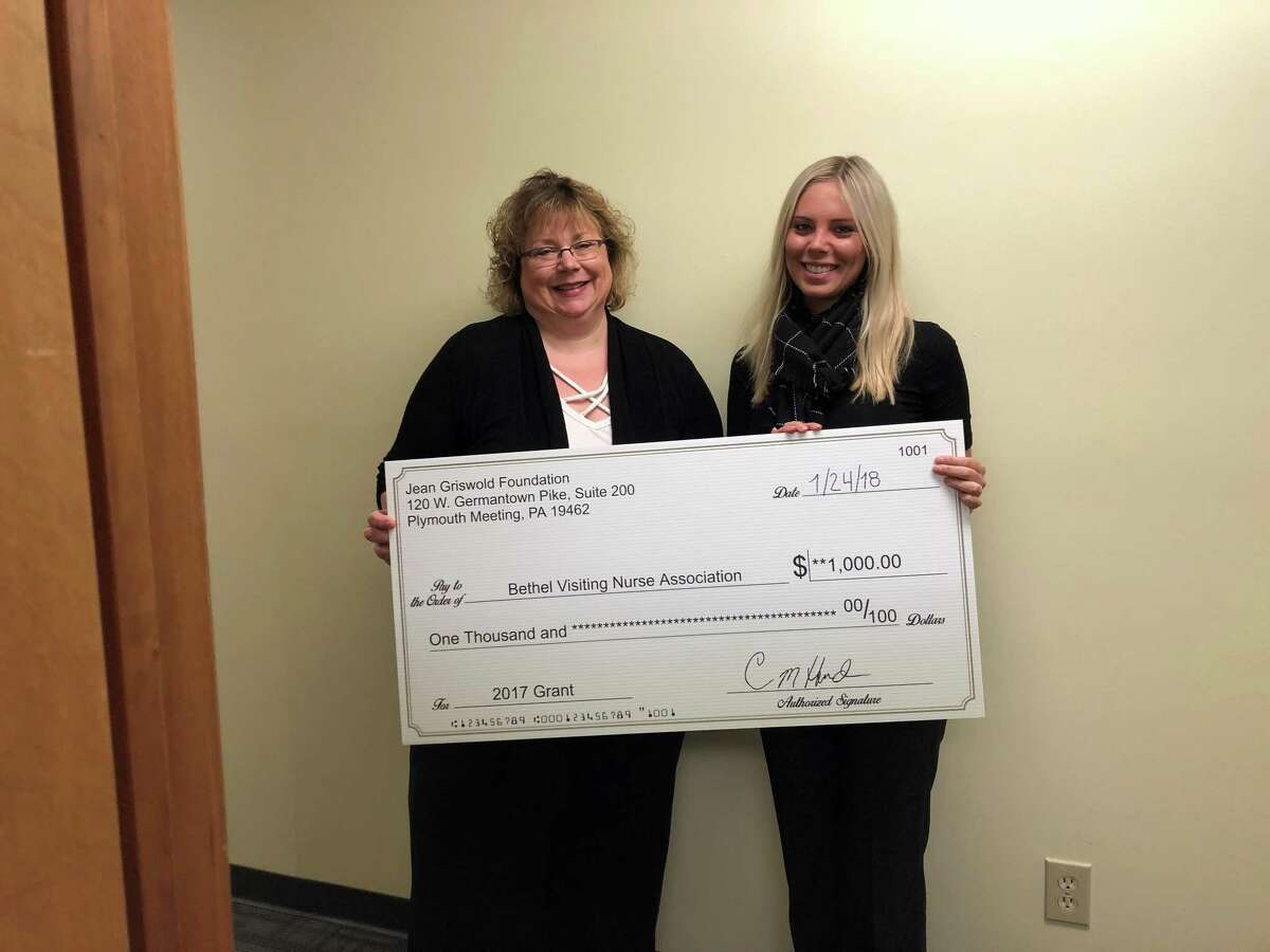 The Bethel Visiting Nurse Association recently received a Jean Griswold Foundation grant for its Telehealth Monitoring Program. Maggie Burke, executive director of the Bethel VNA, (left) and Kelly Coy, case manager at Griswold Home Care, (right) hold the check for the grant.