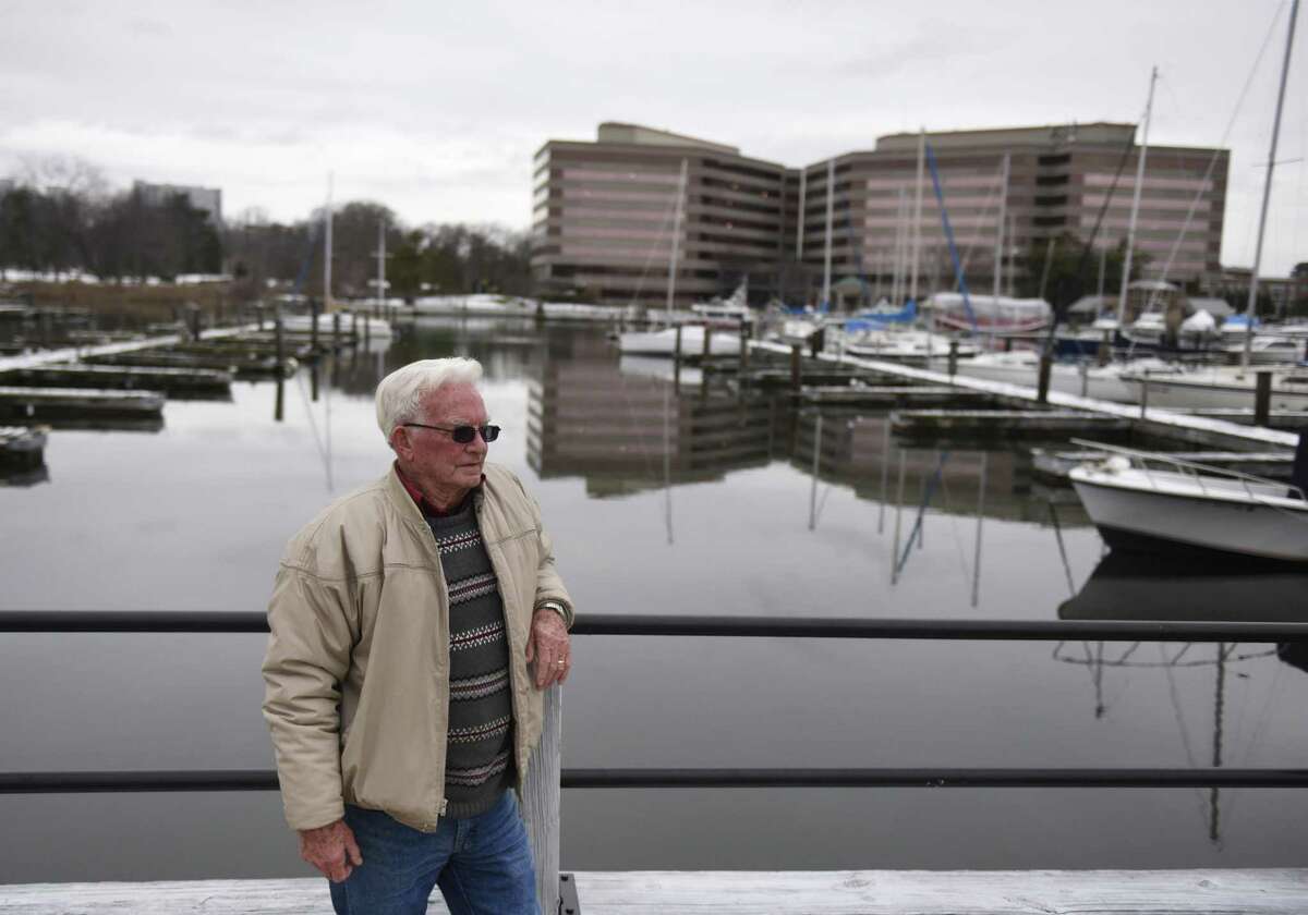 Stamford resident John Gilronan looks out onto the dock where he keeps his boat at Czescik Marina in Stamford, Conn. Monday, Feb. 19, 2018. After nearly two decades of docking his 17-foot boat at the public marina, Gilronan was surprised to hear of a new requirement forcing folks to get a certificate of liability insurance for at least $500,000, and that it had to list the city, its employees, agents and officers as insured.